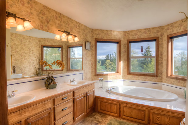 master bathroom with wallpaper